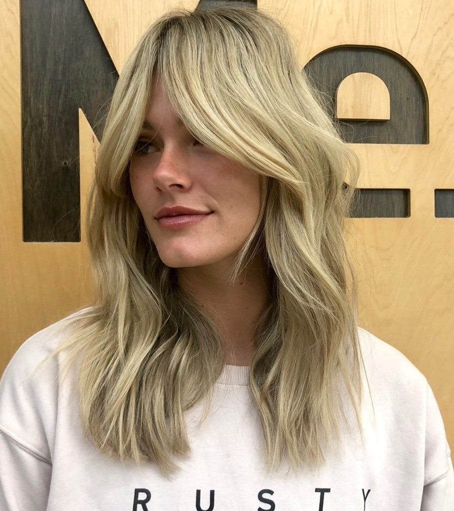 Curtain Bangs for Mid-Length Hair Medium Blonde Hairstyle with Bangs and Soft Wave