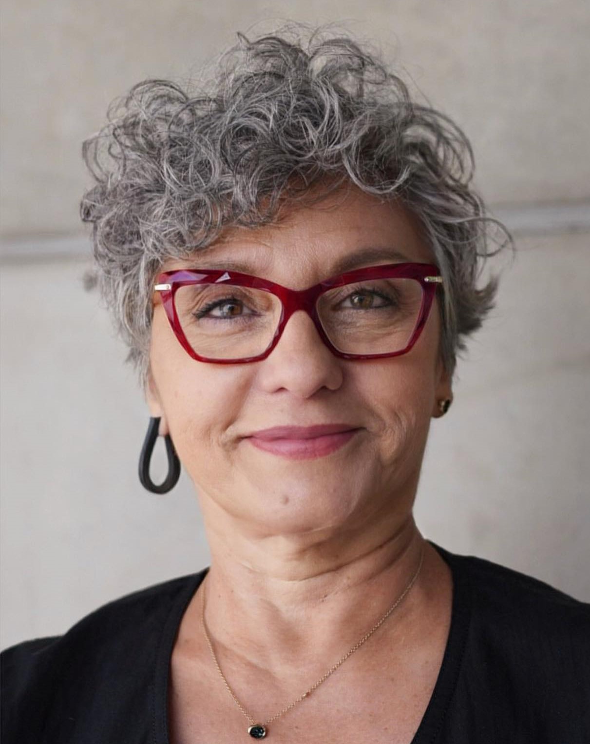 Curly Gray Pixie with Longer Bangs