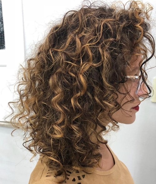 Medium Bouncy Curly Honey Brown Hairstyle