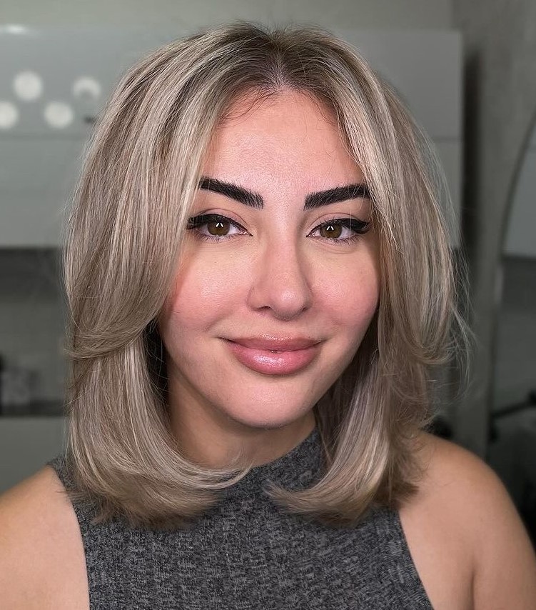 Collarbone Curled-Under Hairstyle