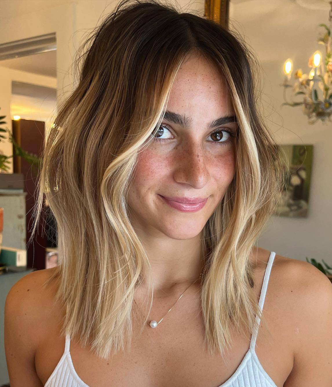 Medium Length Haircut with Curtain Bangs and Face Framing Highlights