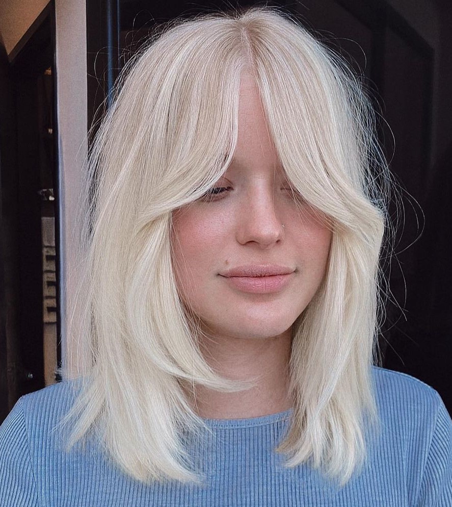 Blonde Shoulder Length Cut with Bottleneck Bangs