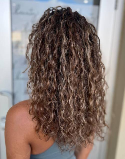Mid Back Layered Hairstyle for Loosely Curly Hair
