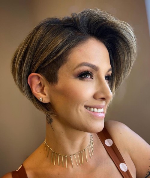 Captivating Pixie Cut for Oval Face Shape Undercut Pixie-Bob with Voluminous Side Bangs