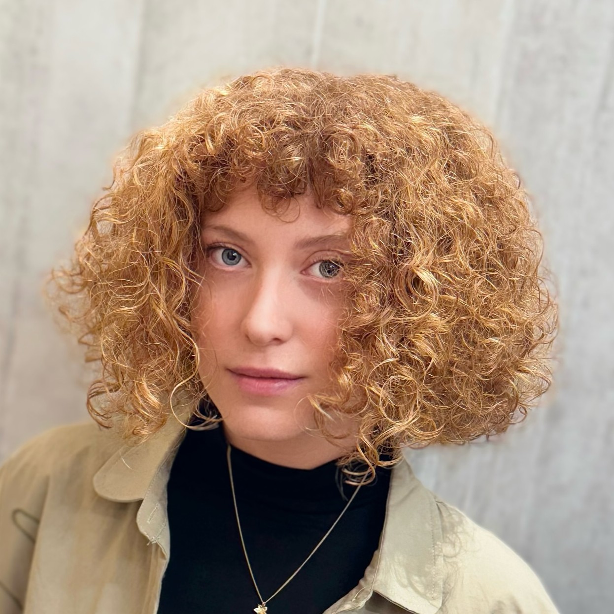 Curly Bob with Bangs