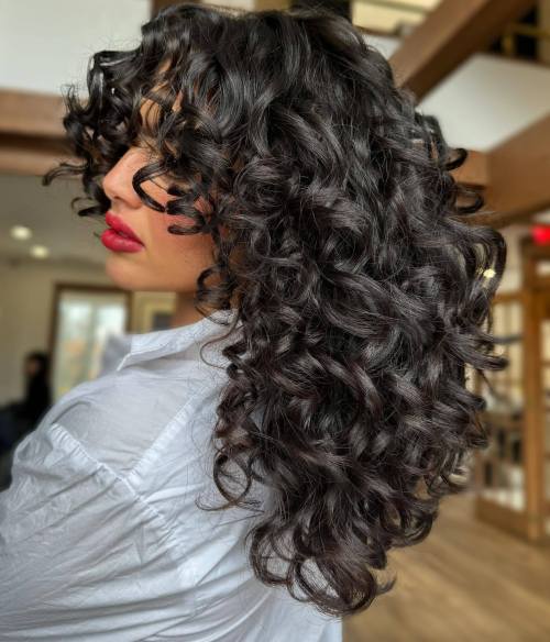 Mid Back Layered Cut for Large Curls