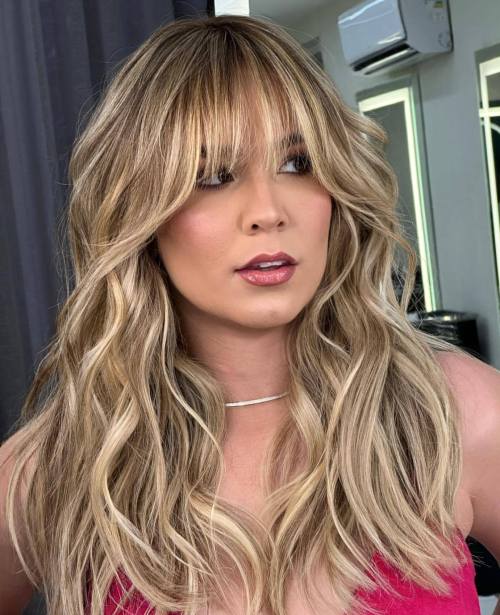 Highlighted Cheekbone Skimming Curtain Bangs