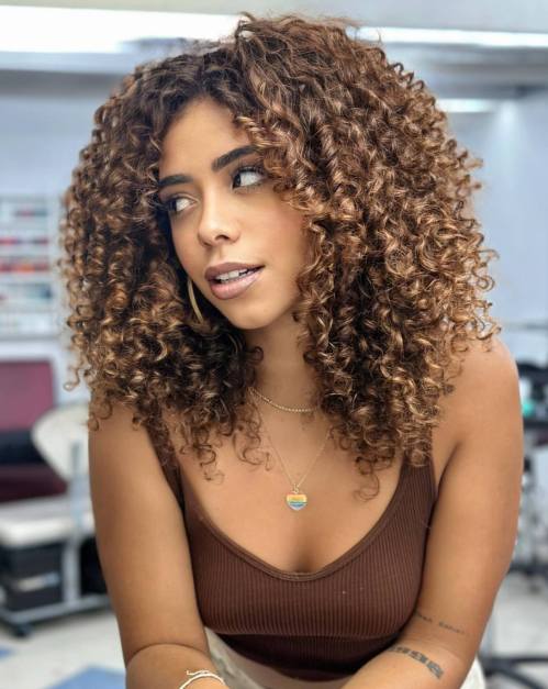 Chic Candlelit Brown Curls with Layers