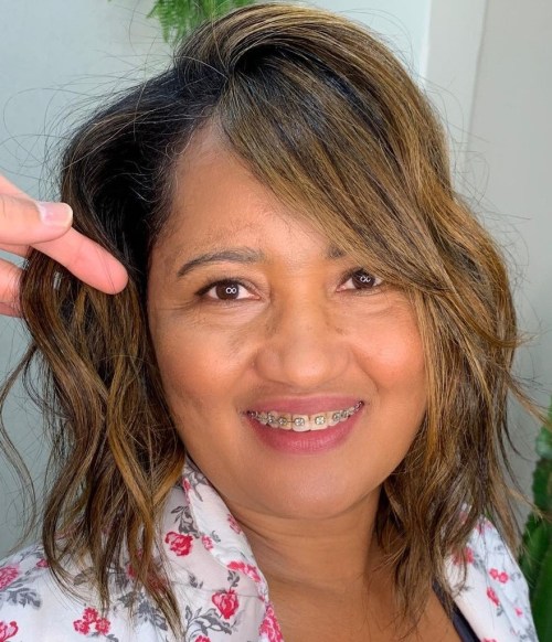 Shoulder Length Bob with Dak Roots and Brown Highlights